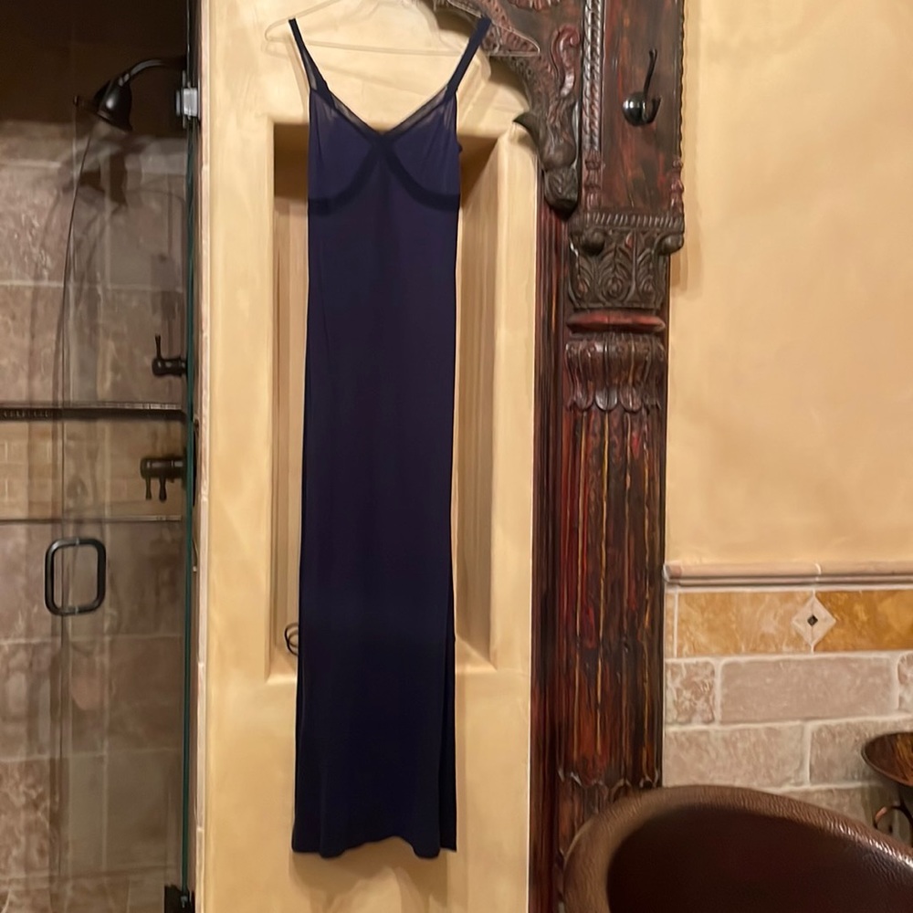 This dress is made by Eloise in size small. It’s a navy T shirt fabric.